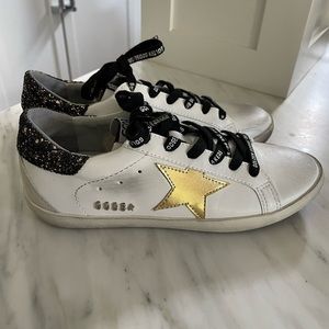 Golden Goose Superstar white leather with gold star black glitter